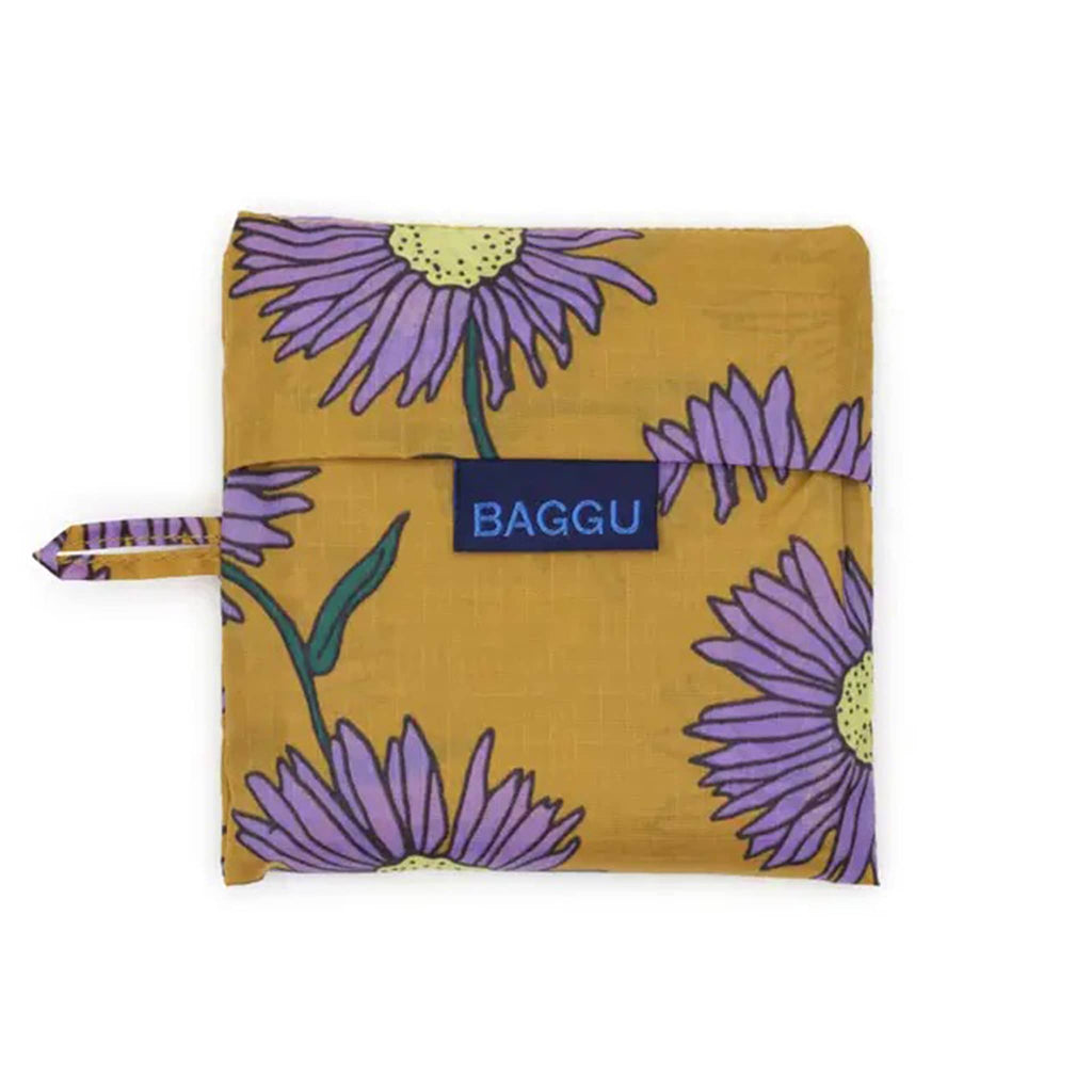 Floral-patterned tote in matching pouch with 'BAGGU' branding on a white background.