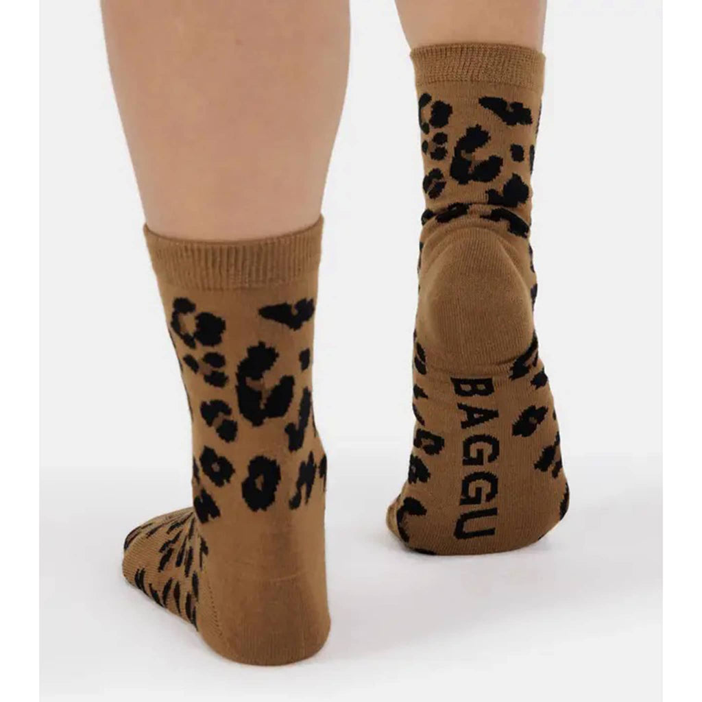 Baggu Bamboo Rayon Crew Socks in Dark Leopard print, on model's feet.