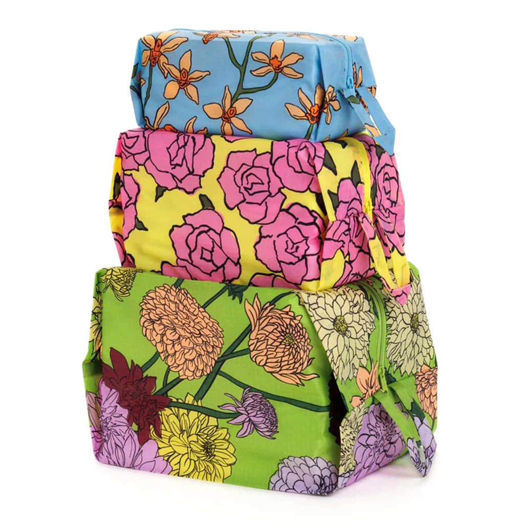Baggu reusable recycled ripstop nylon 3D zip bags, set of 3 in Garden Flowers prints, stuffed and stacked.