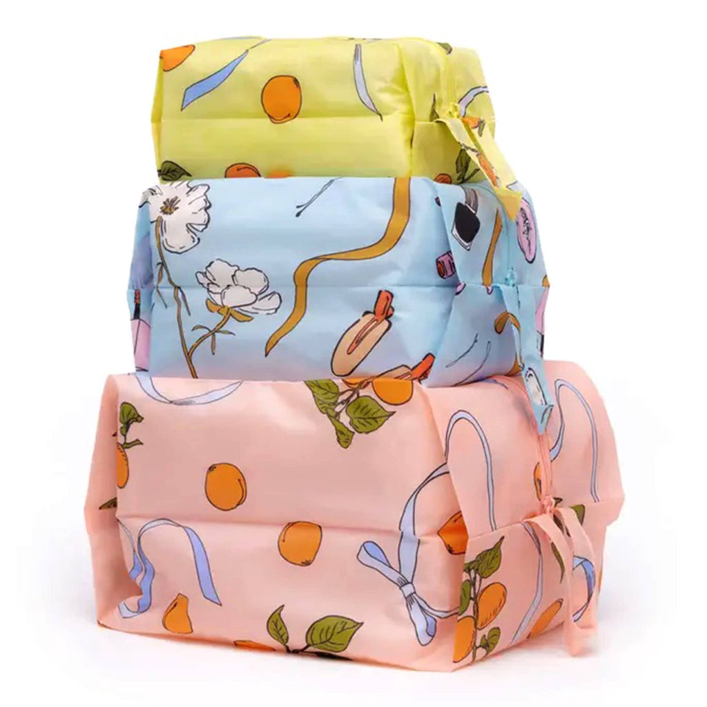 Baggu 3D zip set trio in Get Ready With Me collection prints, stuffed and stacked.