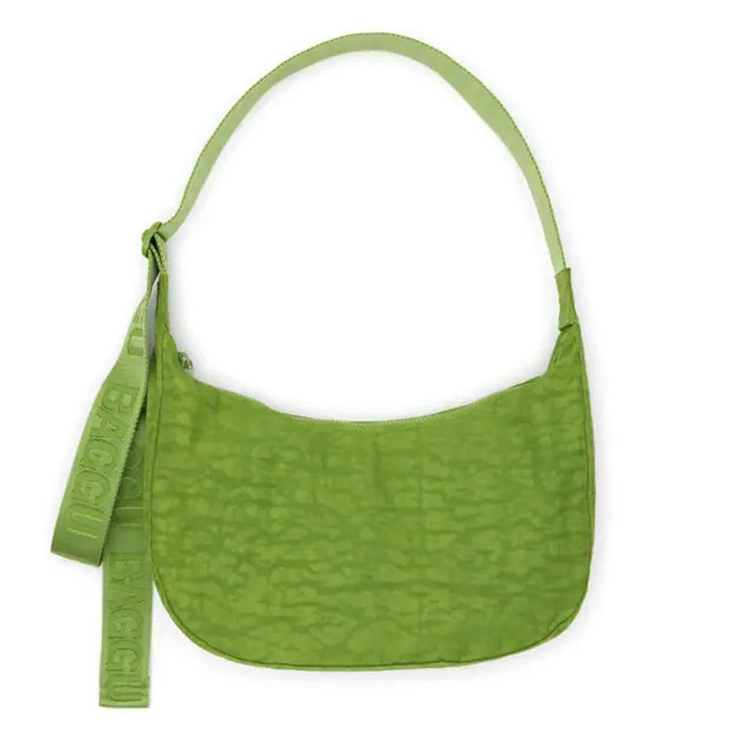 Baggu Medium Crescent Bag in Green Juice, front view.