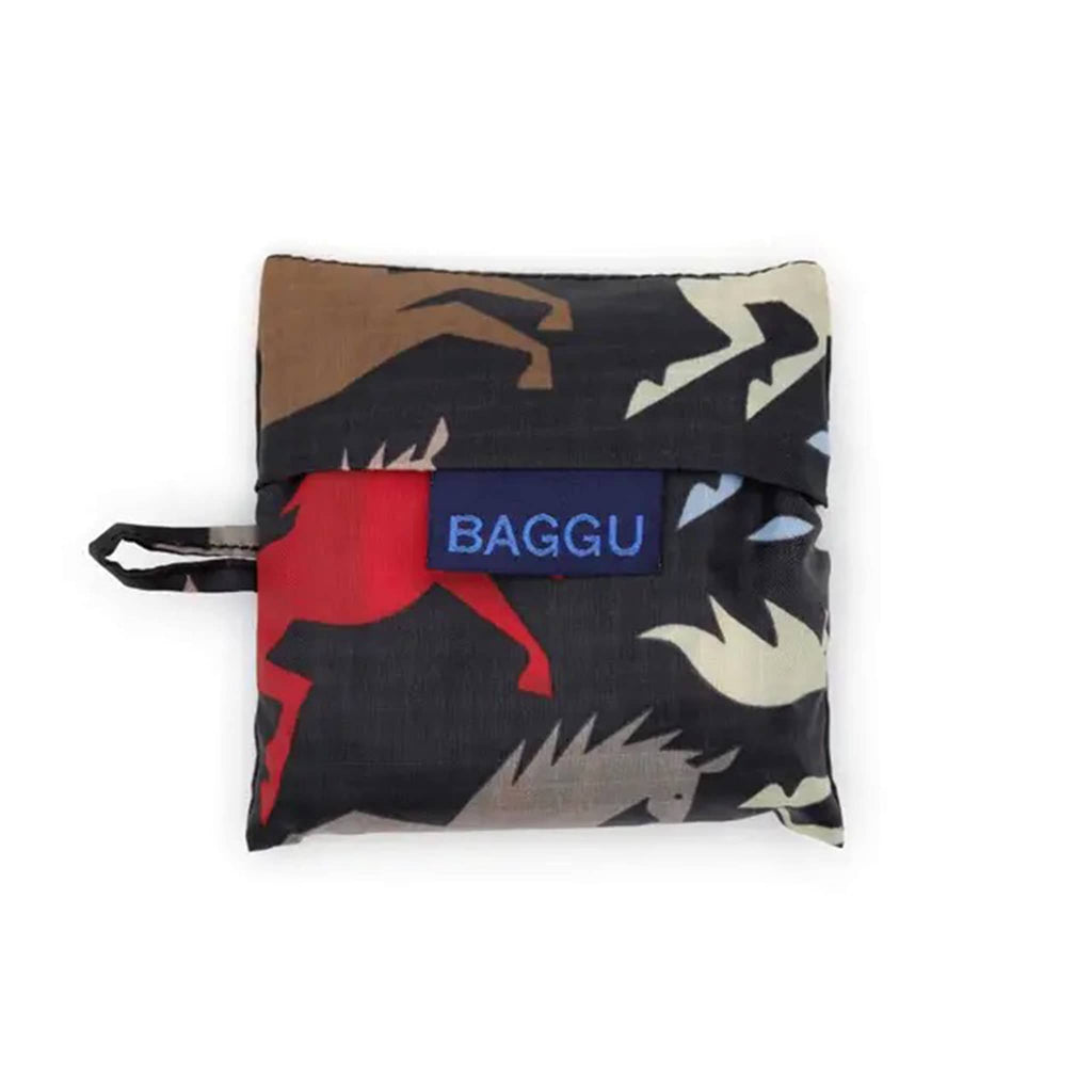 Folded reusable bag with horse pattern in matching pouch with BAGGU label on a white background.