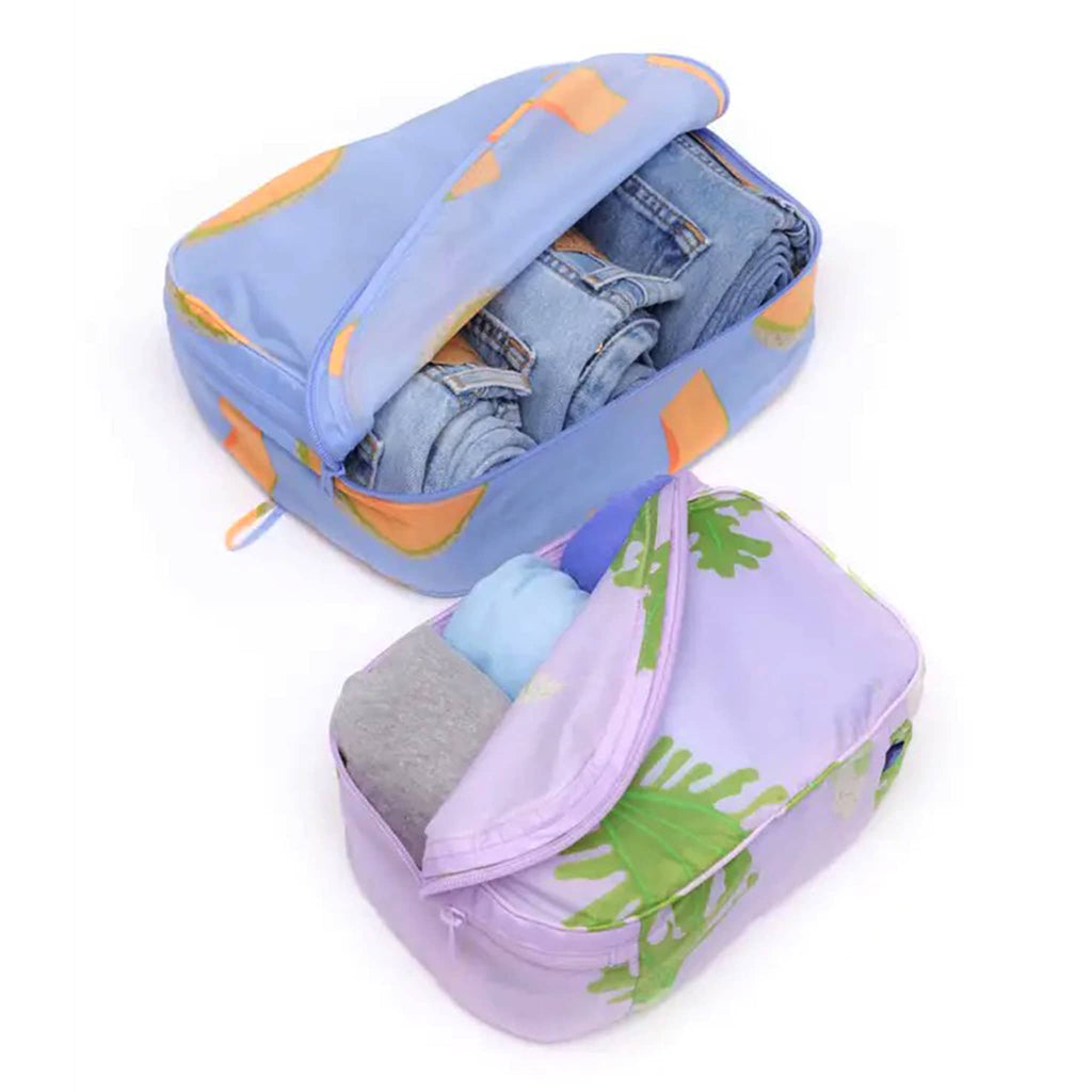 Baggu Packing Cube Set of 2 in Japanese Produce collection prints, open with jeans and tees inside.