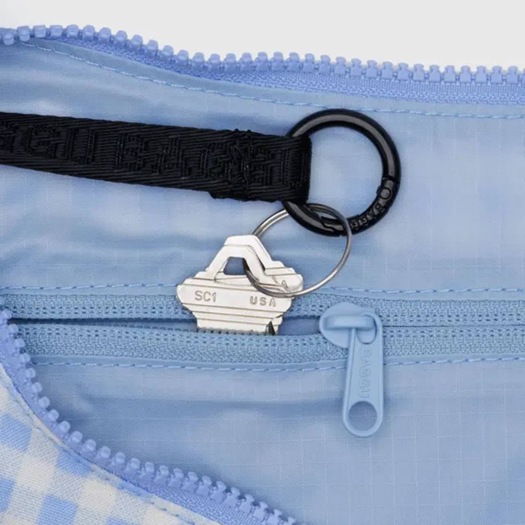 Baggu light blue gingham medium ripstop nylon crescent bag, interior detail.