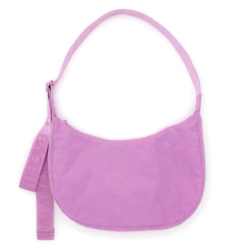 Baggu Medium Ripstop Nylon Crescent Bag in Peony with 47 inch adjustable tonal logo strap, front view.