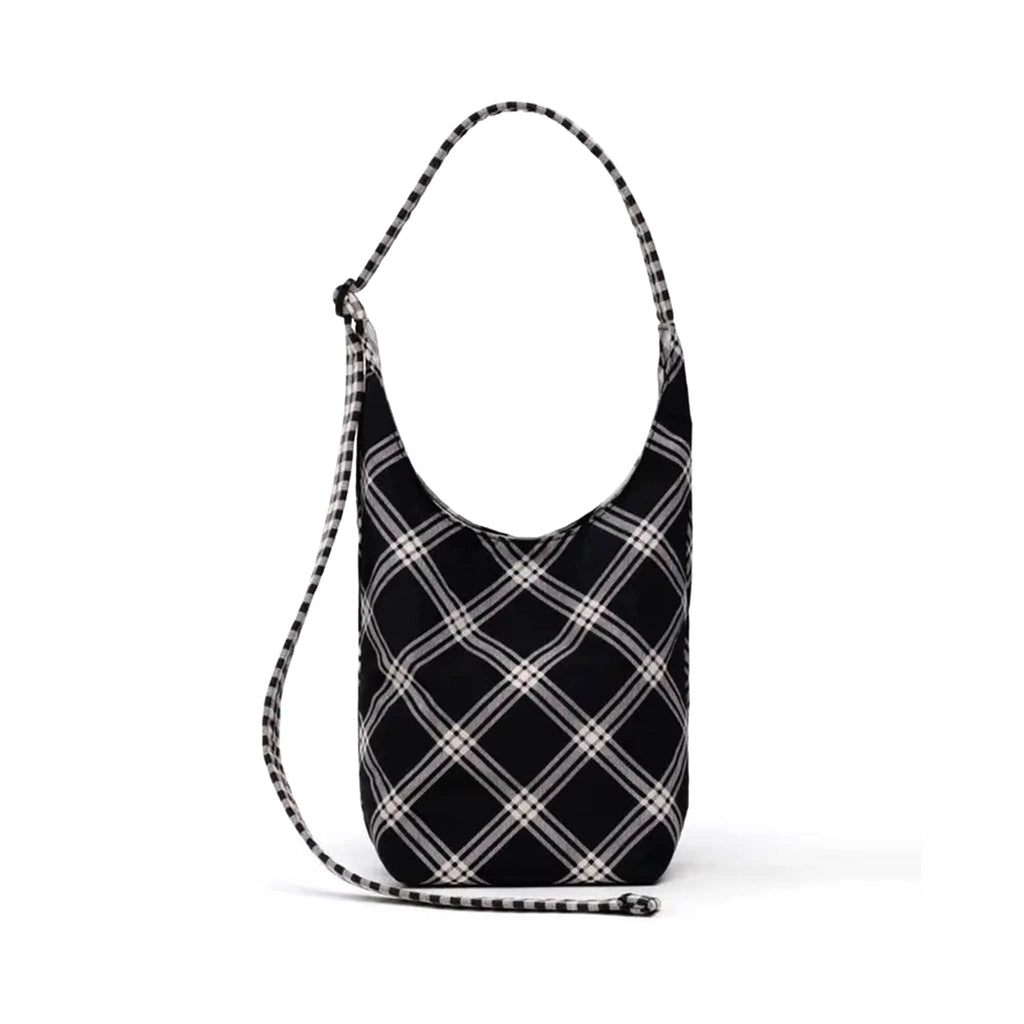 Black and white plaid shoulder bag on a white background.