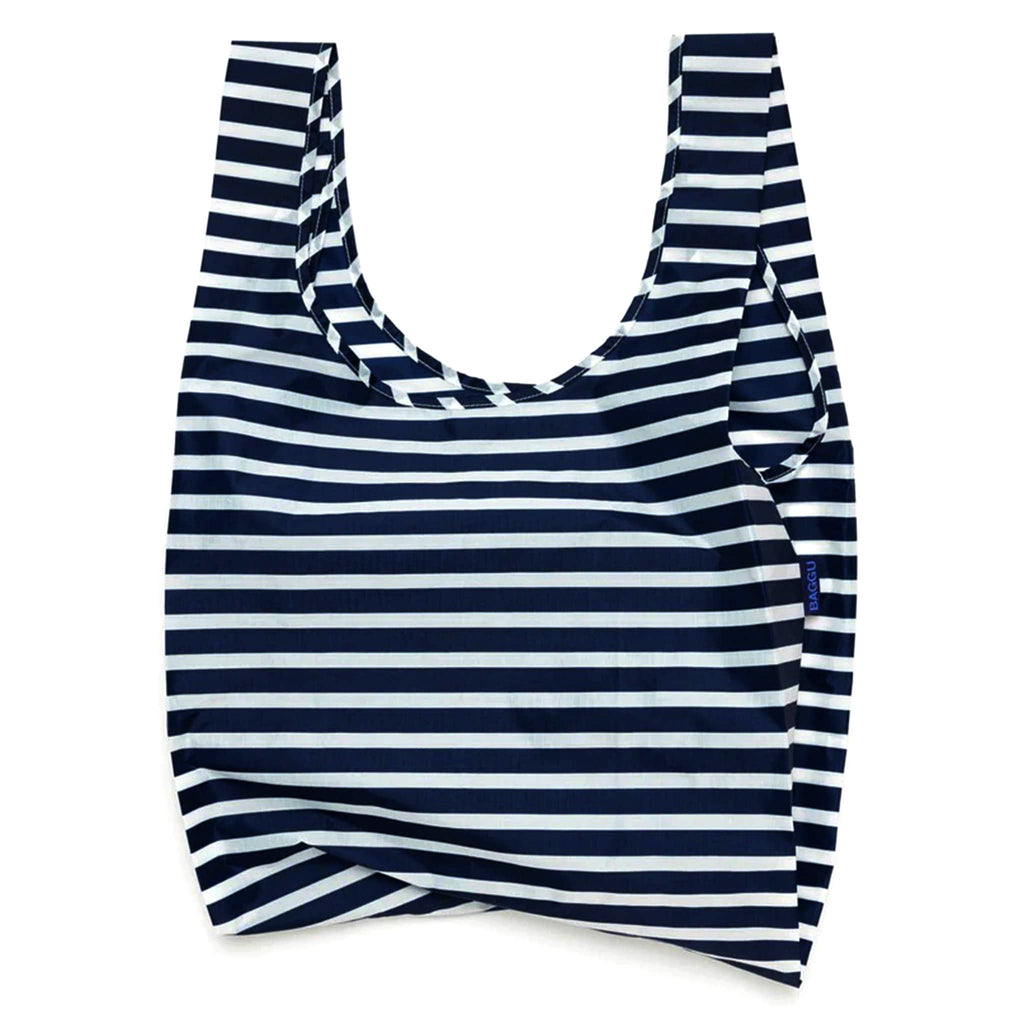 Baggu standard size eco-friendly recycled ripstop nylon reusable tote bag with navy blue and white striped pattern, unfolded.