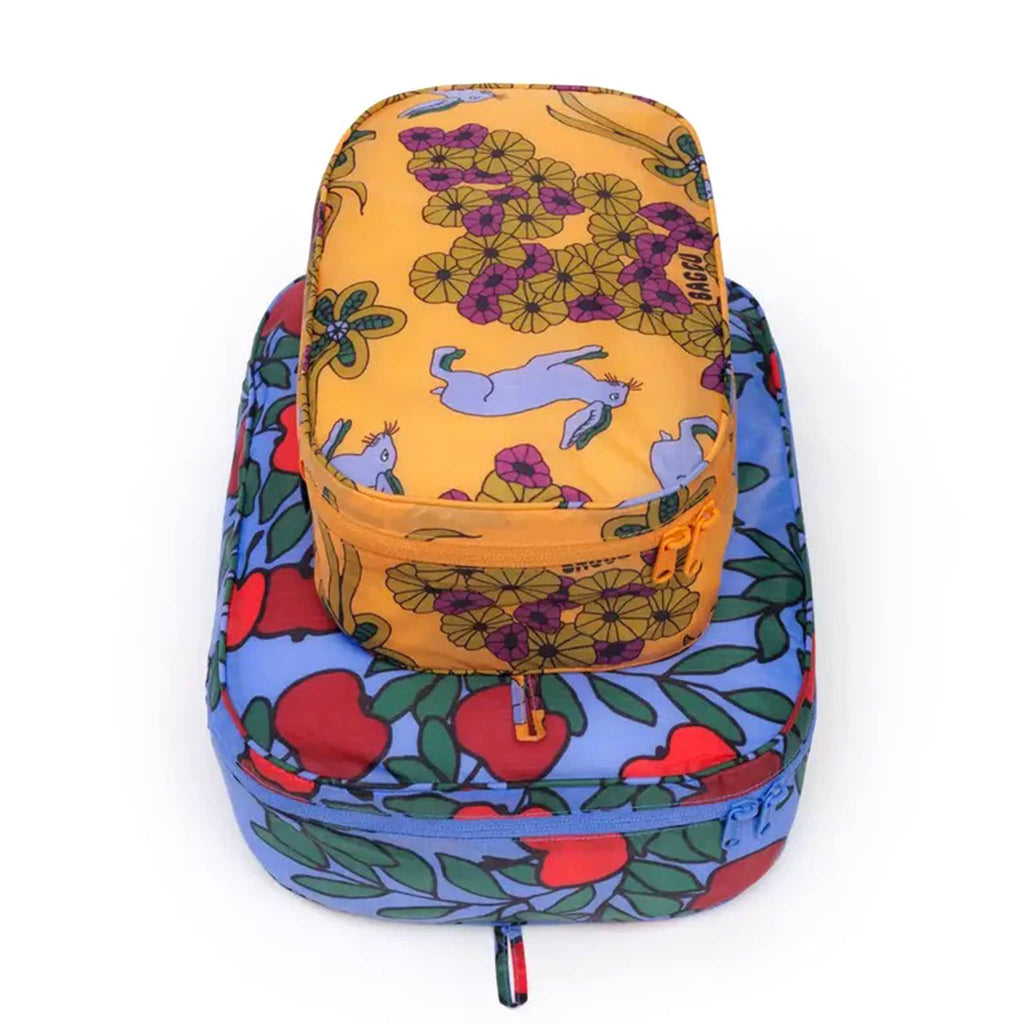 Baggu Night Orchard reusable recycled nylon packing cubes, set of two stuffed and stacked.