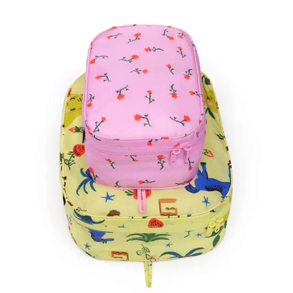 Baggu Painted Prairie reusable recycled nylon packing cubes, set of two stuffed and stacked.
