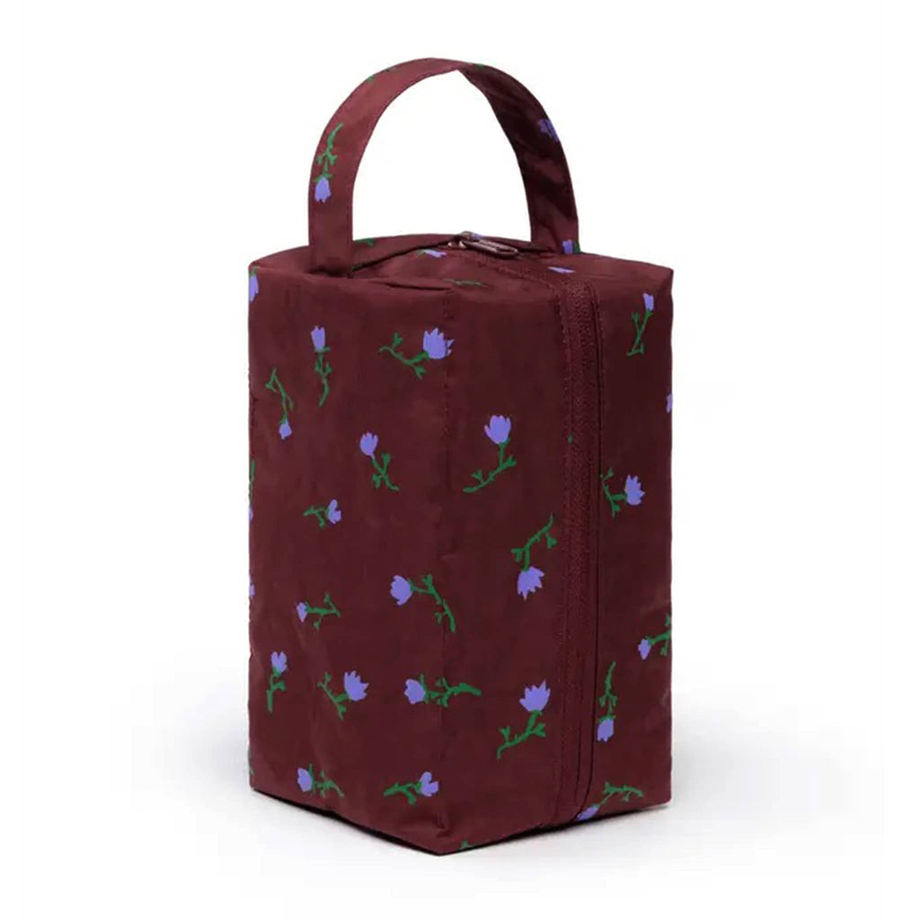 Baggu Painted Wildflower Dopp Kit, standing upright with handle.