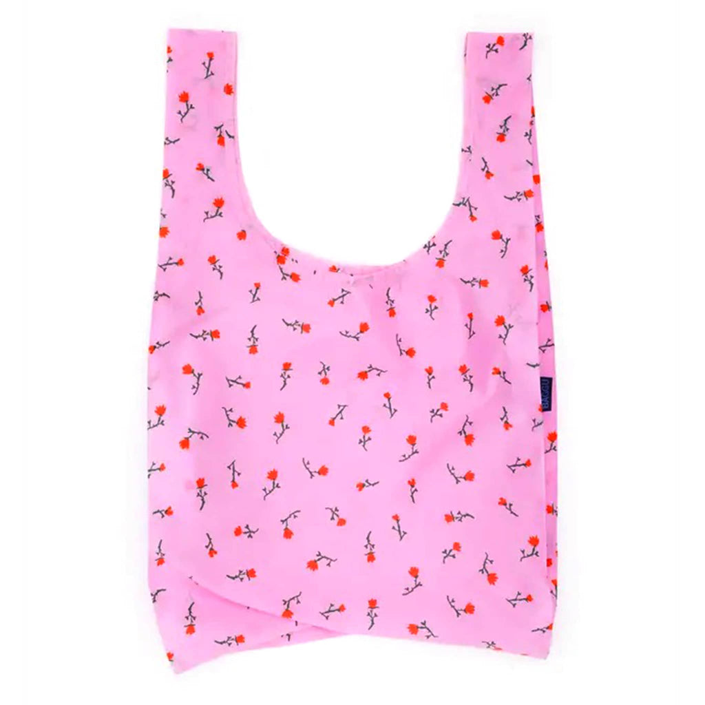 Pink reusable bag with floral pattern on a white background