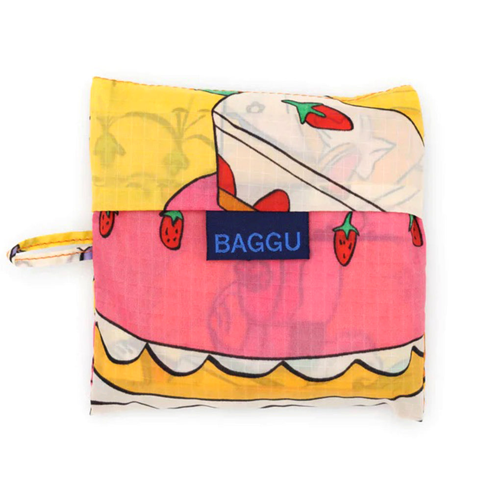 Baggu standard size eco-friendly recycled ripstop nylon reusable tote bag in Patisserie, in pouch.