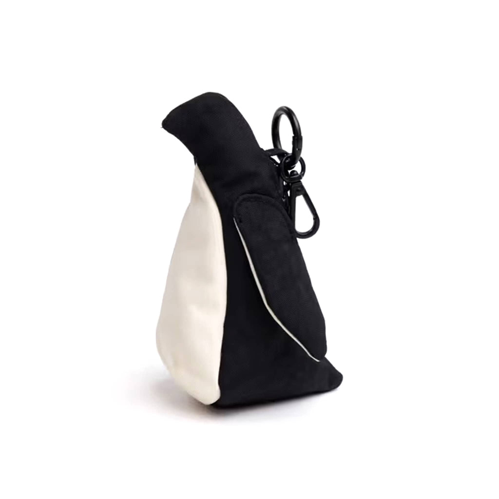 Baggu Penguin bag charm in black and white recycled nylon, front angle view.