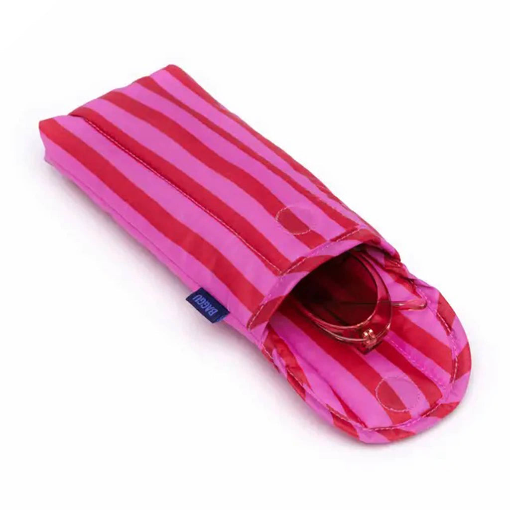 Baggu Pink and Red Painted Stripe puffy recycled ripstop nylon and polyester glasses sleeve, open with glasses inside.