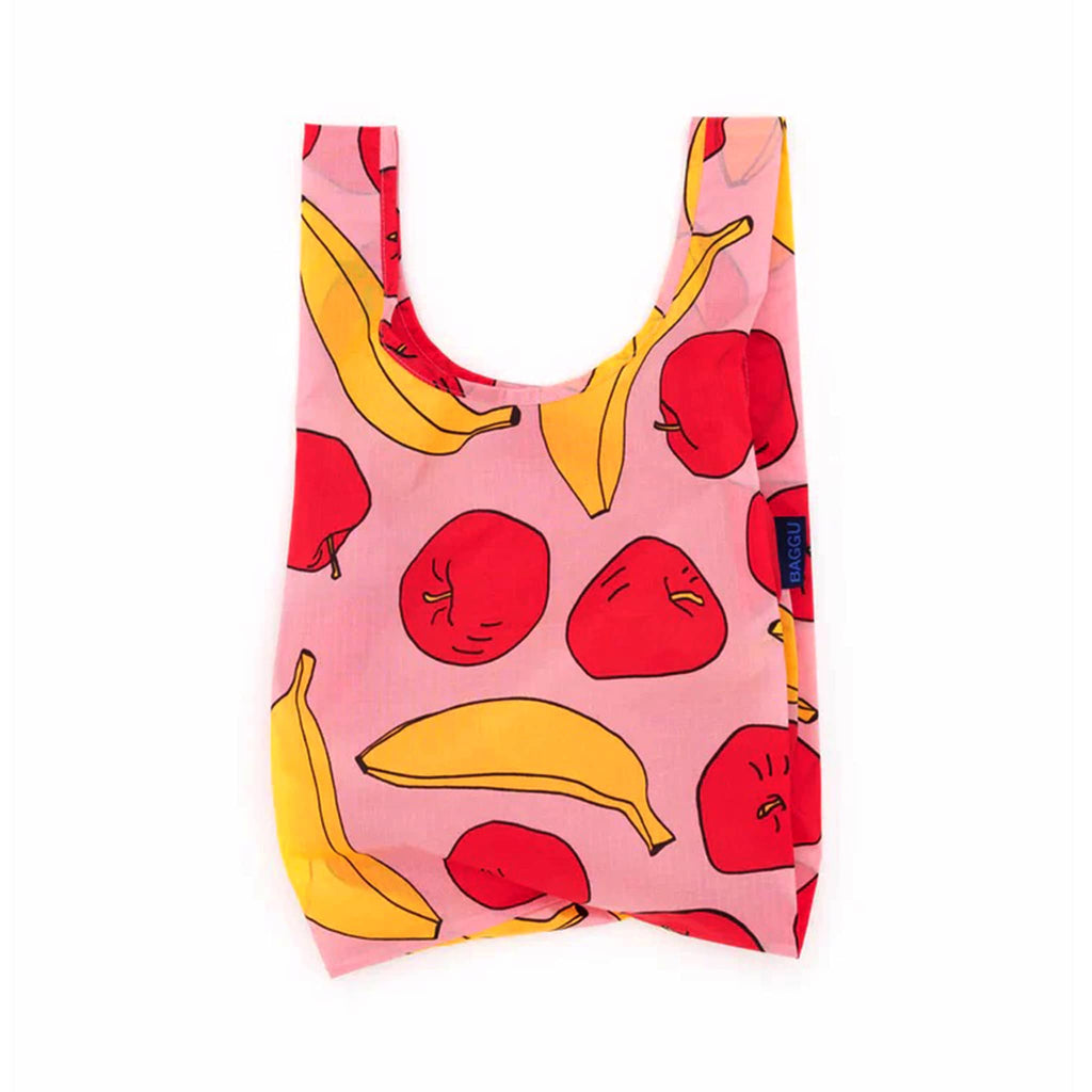 Baby Baggu small eco-friendly recycled ripstop nylon reusable tote bag in Pink Apples and Bananas, unfolded.