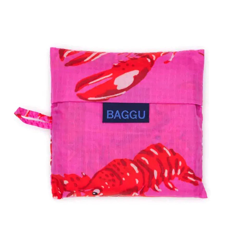 Baggu Pink Lobster standard ripstop nylon reusable bag in pouch.
