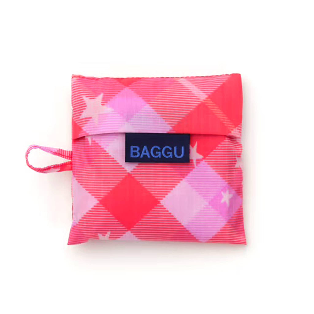 Baby Baggu reusable bag in Pink Star Plaid, in matching pouch, on a white background.