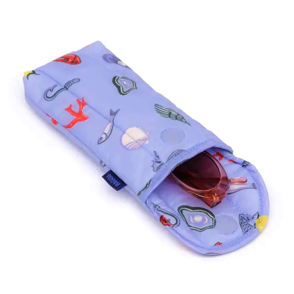 Baggu Sea Charms puffy recycled ripstop nylon and polyester glasses sleeve, open with glasses inside.