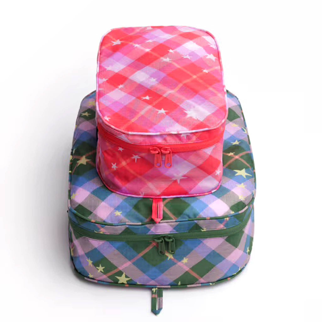 Baggu Star Plaid reusable recycled nylon packing cubes, set of two stuffed and stacked.