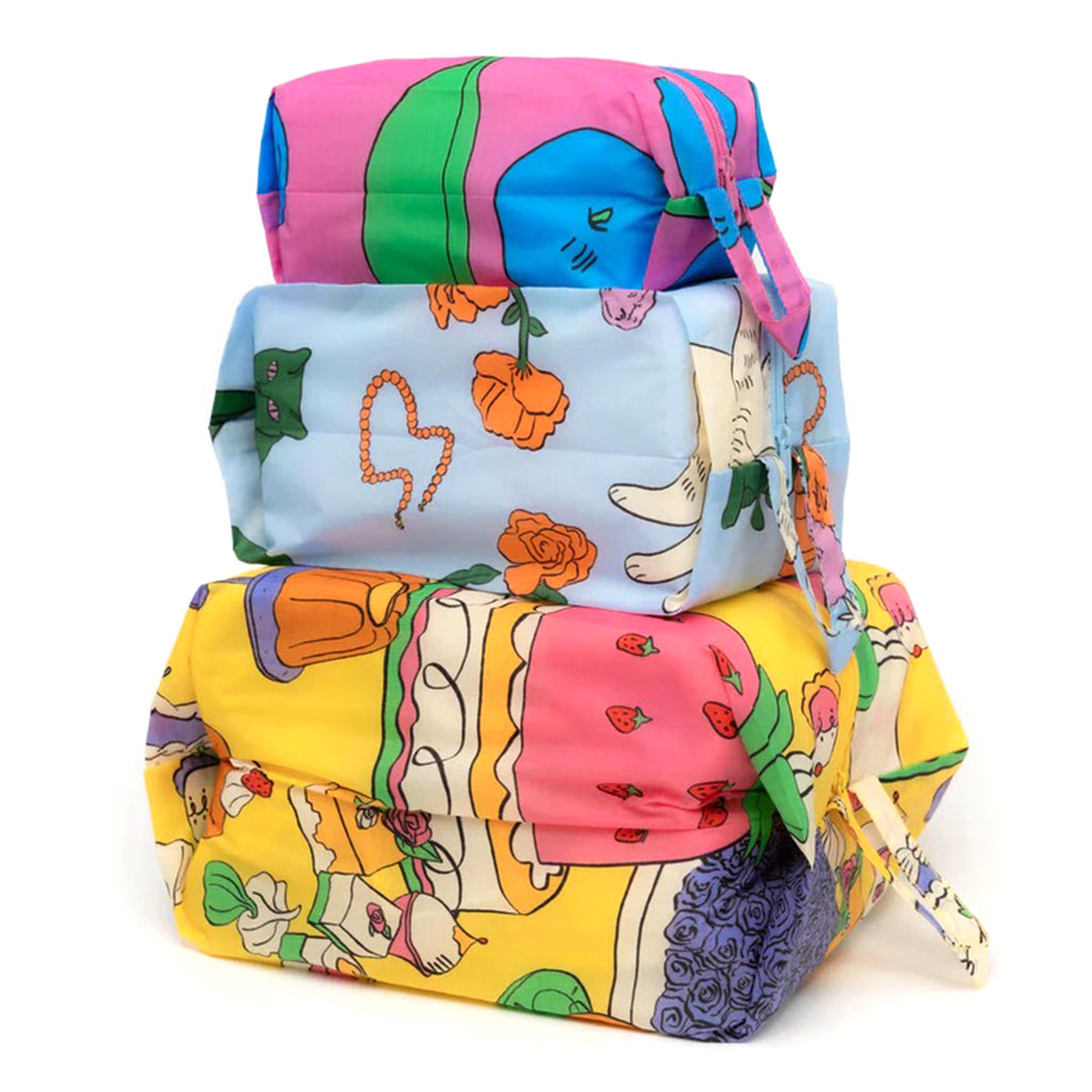 Baggu reusable recycled ripstop nylon 3D zip bags, set of 3 in Still Life prints, stuffed and stacked.