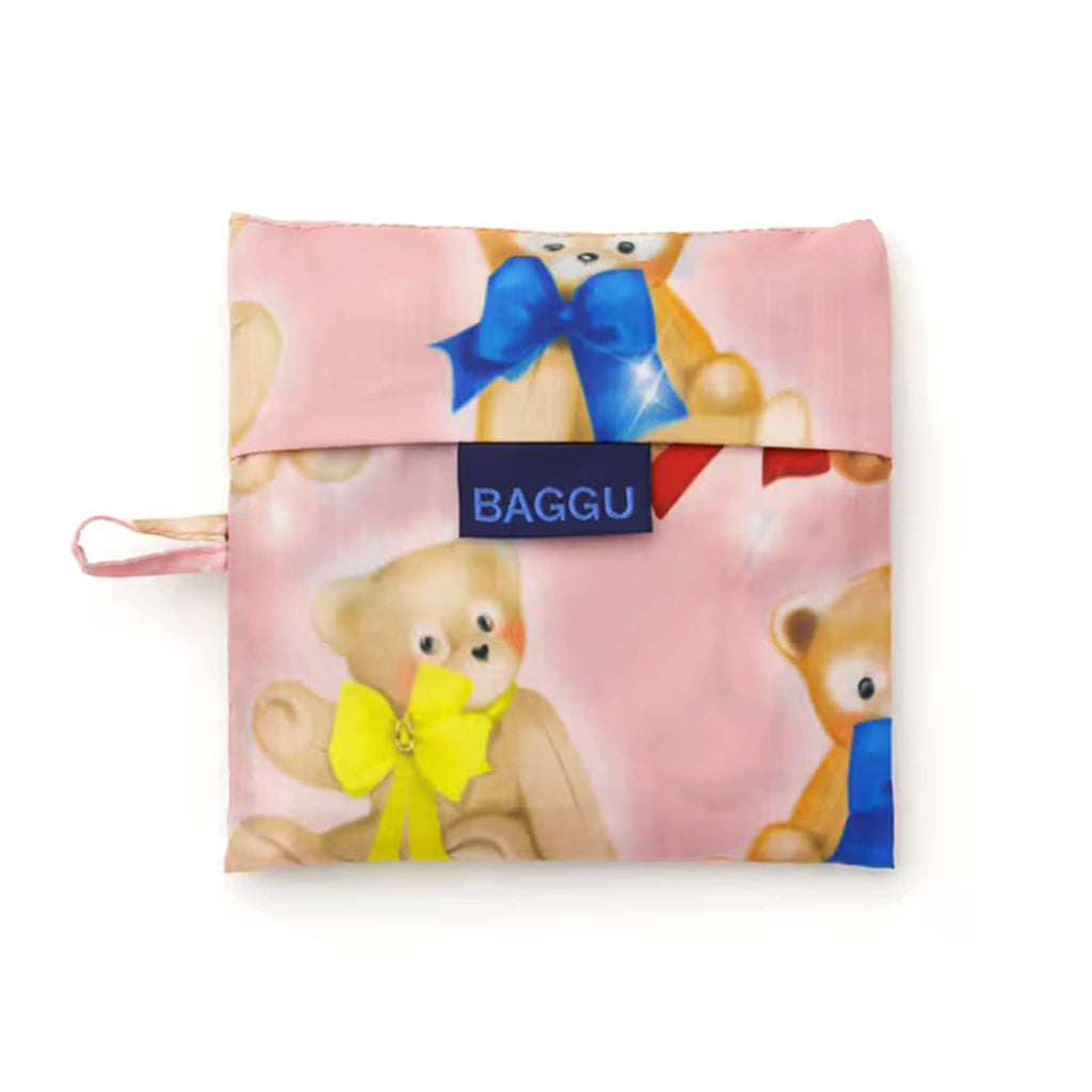 Pink pouch with teddy bear design and BAGGU logo on a white background.