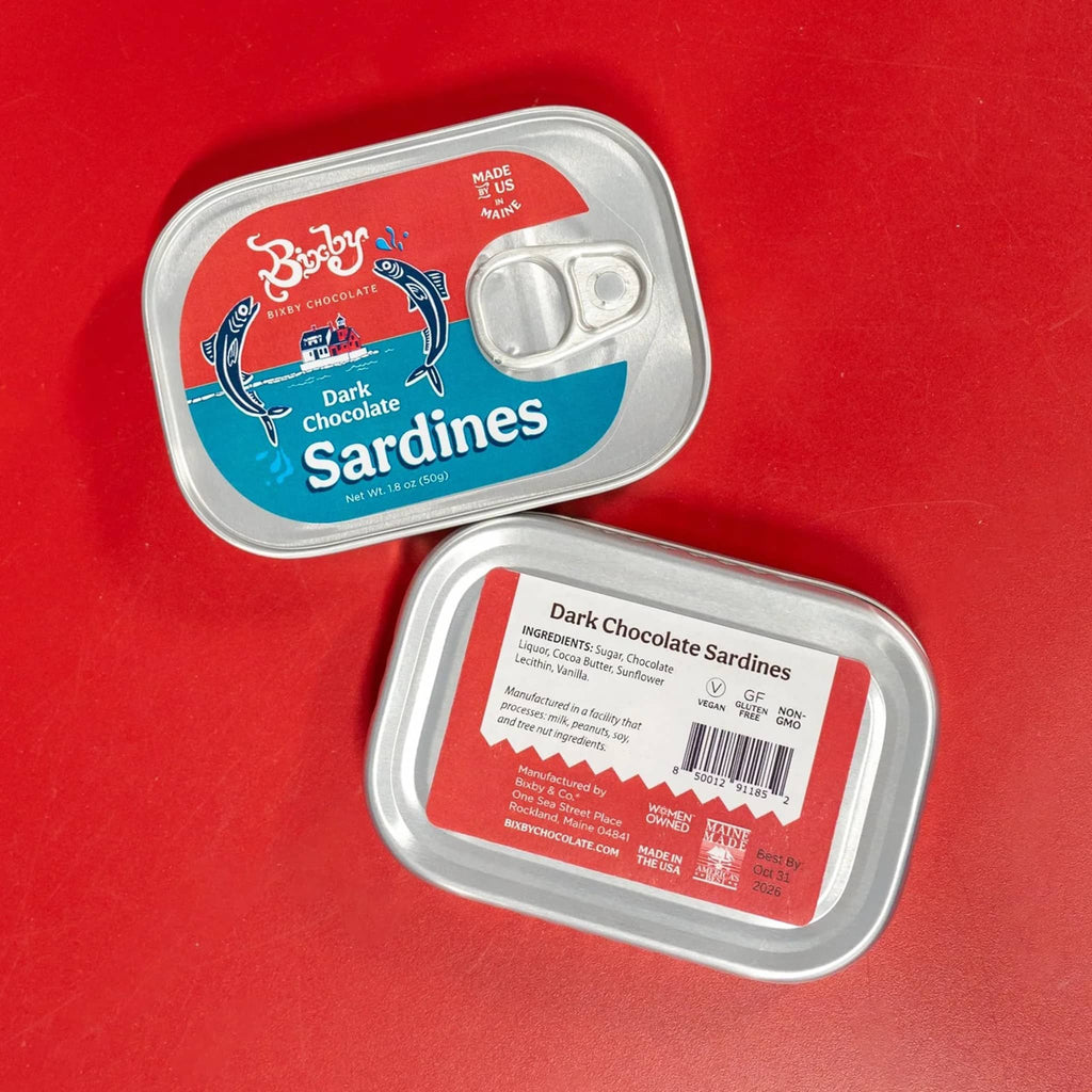 Bixby Dark Chocolate Sardines in vintage-style tin, front and back view on red background.