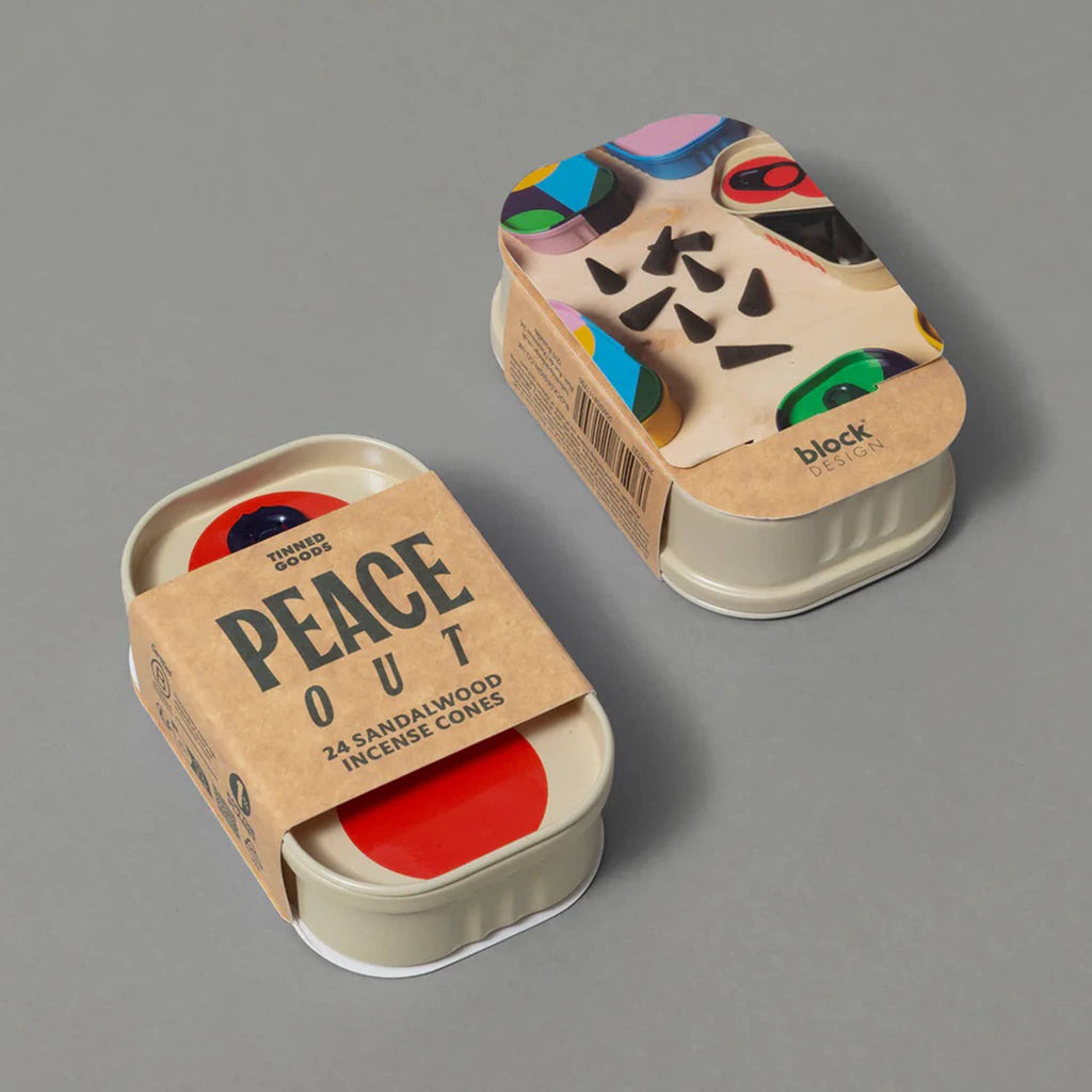Tinned Goods sandalwood incense cones in tin packaging, top and bottom shown on a gray background.