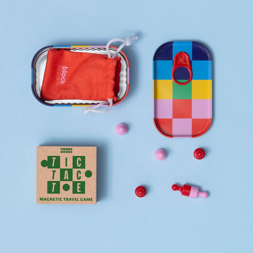 Colorful magnetic travel Tic Tac Toe game set with tin packaging, on a blue background.