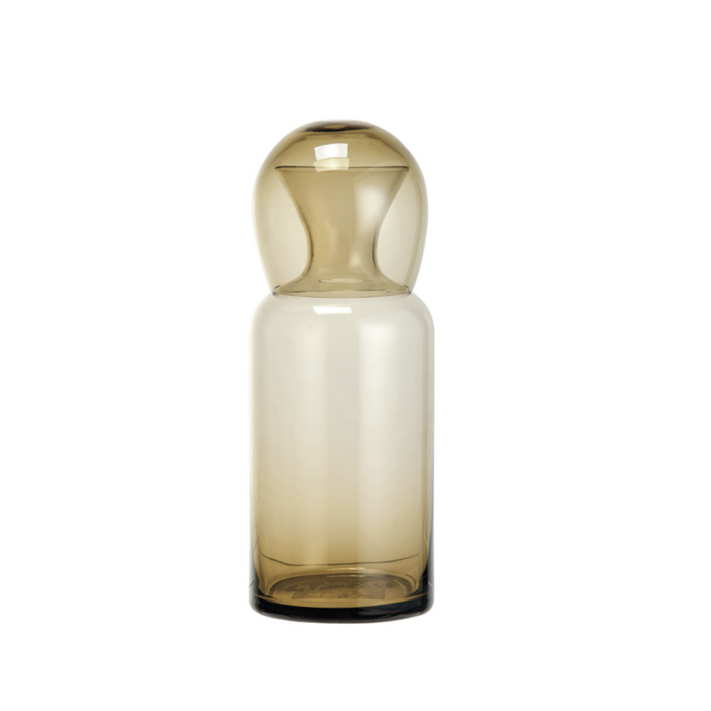 Bloomingville 16 oz glass carafe with 12 oz drinking glass amber, glass is upside down on the top of the carafe.