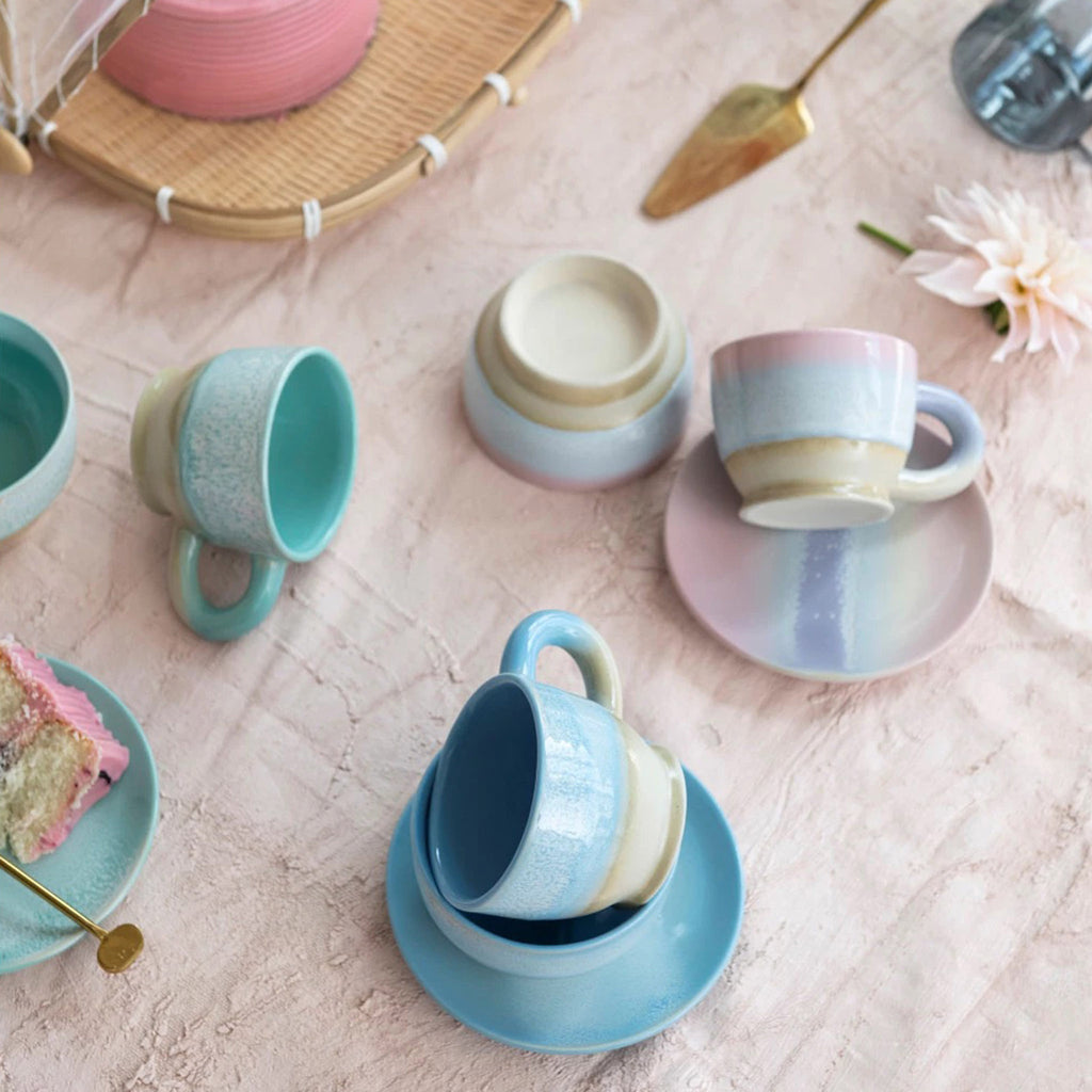 Bloomingville Stoneware Bowls with pastel reactive glaze in blue, green and pink with matching mugs and plates.