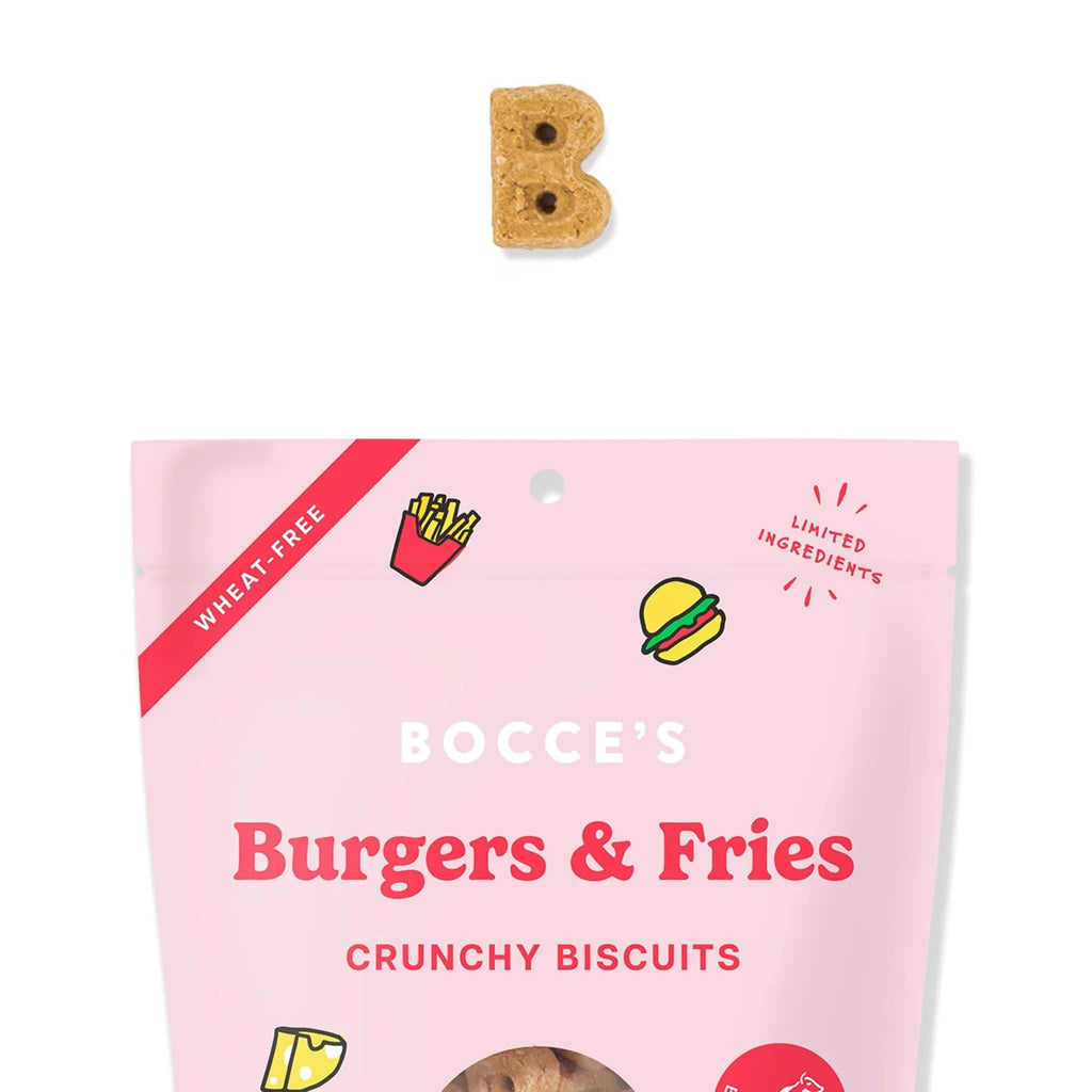 Bocce's Bakery Burgers & Fries Crunchy Dog Biscuit Treats in pink pouch packaging, front view with a sample "B" shaped treat above.