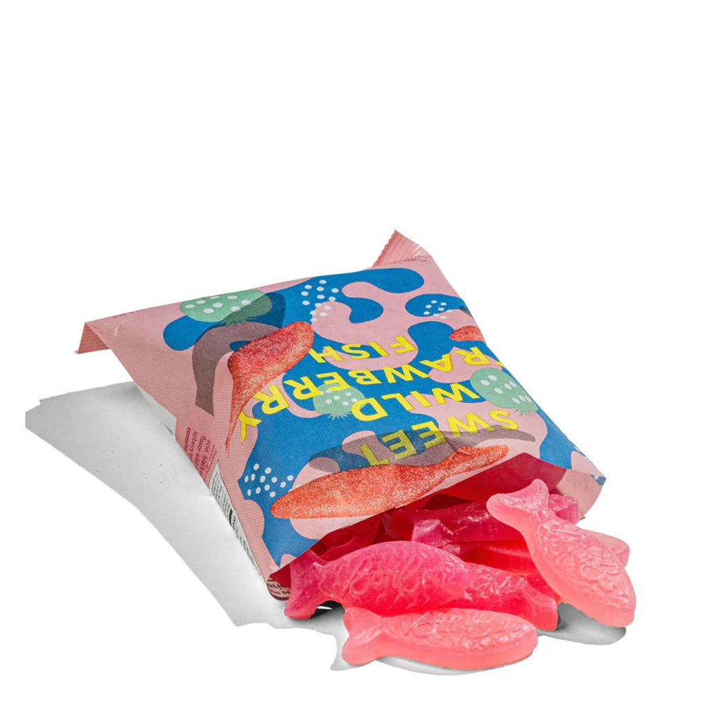 BonBon NYC Sweet Wild Strawberry Fish swedish gummy candy in pink packaging, pink fish candies spilling out of open package.