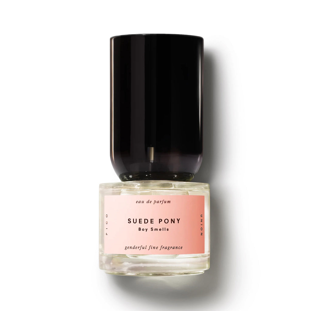 Boy Smells Suede Pony Eau de Parfum in bottle with pink label and shaped black cap.