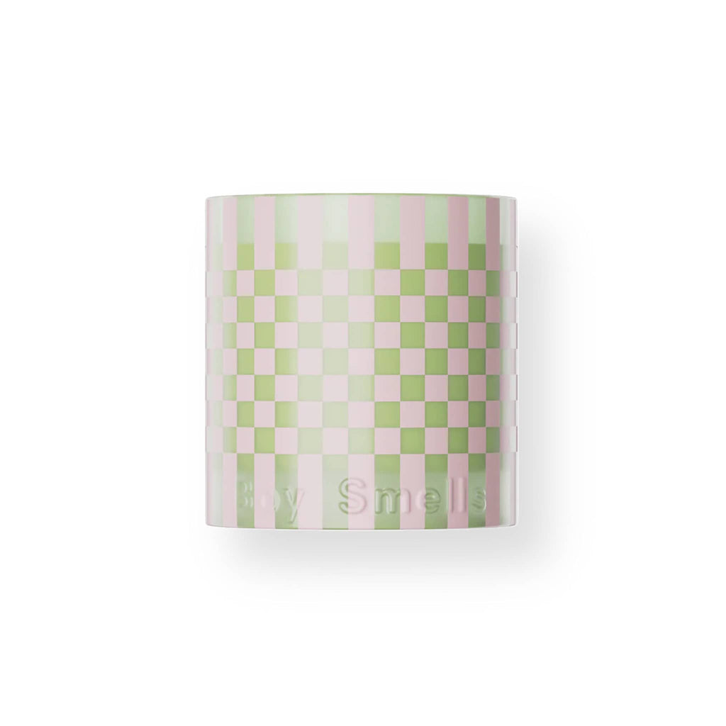 Boy Smells holiday Salty Caramel candle in pink and lime green checkered glass vessel.