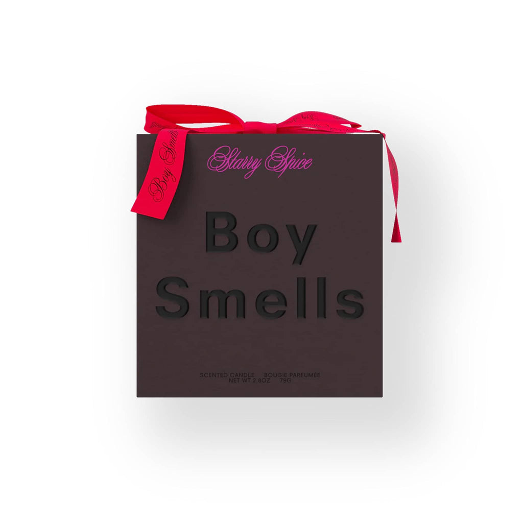 Boy Smells holiday Starry Spice candle in deep purple box with red bow.