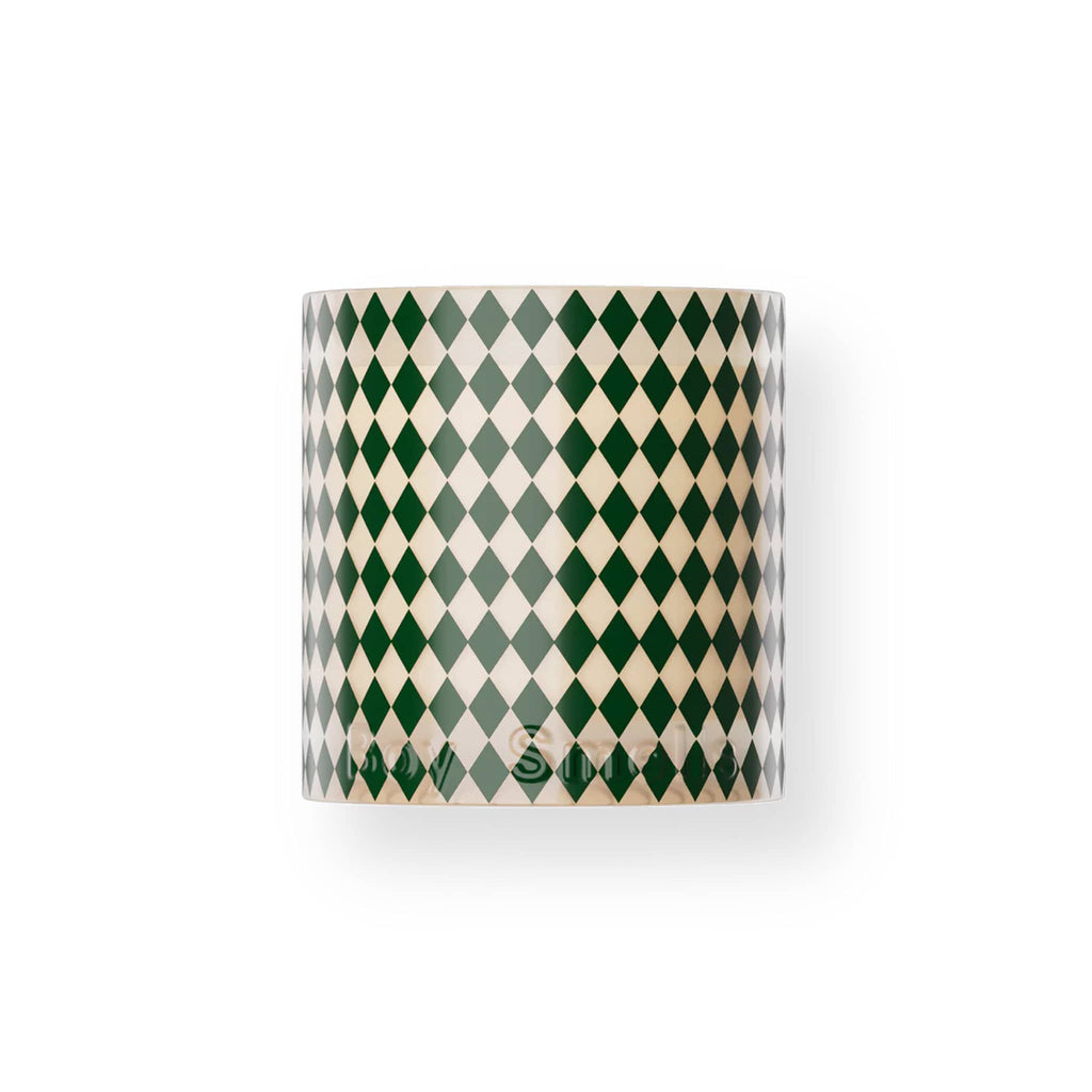 Boy Smells holiday Xxmas Tree candle in pink and green diamond pattern glass vessel.