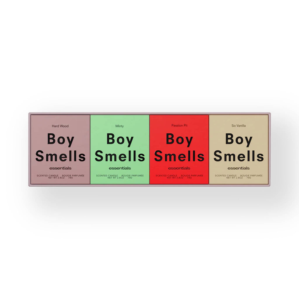 Four-pack of 'Boy Smells' candles in different color boxes, on a white background.