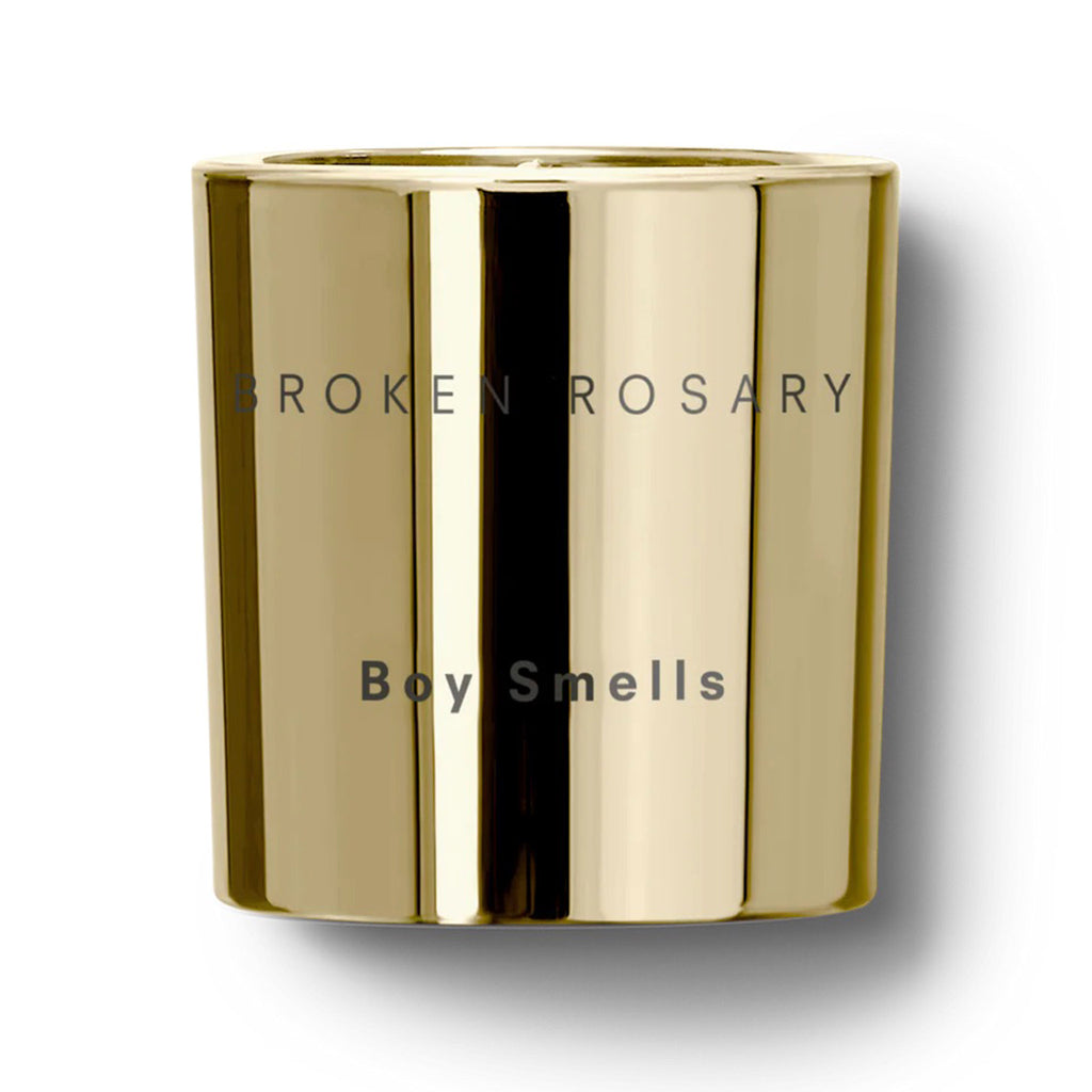Boy Smells 2023 Limited Edition Holiday Broken Rosary scented coconut beeswax blend candle in metallic gold glass tumbler with "spiritous" and "boy smells" engraved on the front.