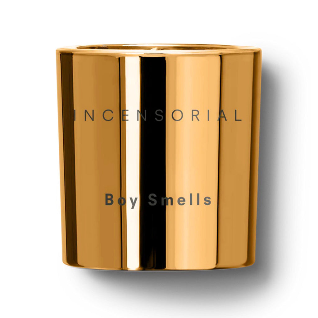 Boy Smells 2023 Limited Edition Holiday Incensorial scented coconut beeswax blend candle in metallic rose gold glass tumbler with "incensorial" and "boy smells" engraved on the front.