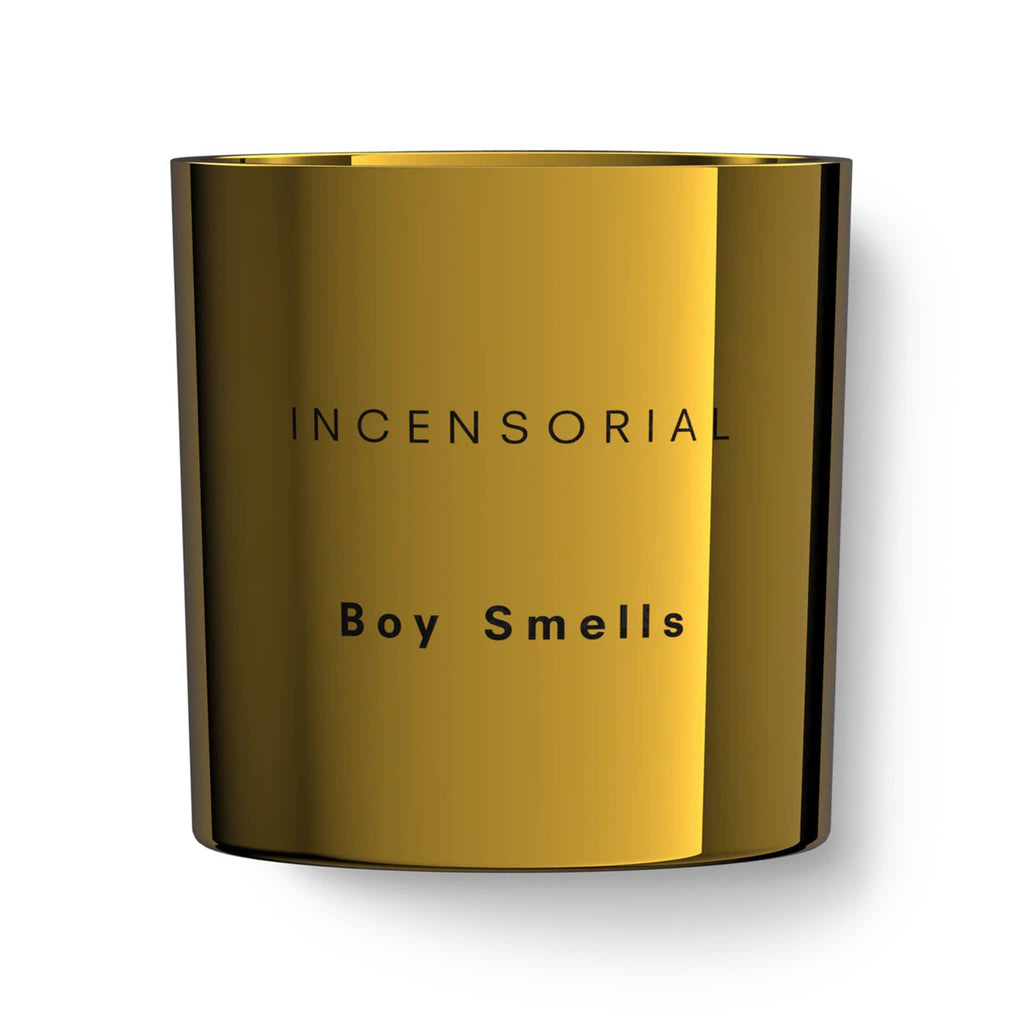 Boy Smells 2024 Limited Edition Holiday Incensorial scented coconut beeswax blend magnum 3-wick candle in metallic gold glass tumbler with "incensorial" and "boy smells" engraved on the front.