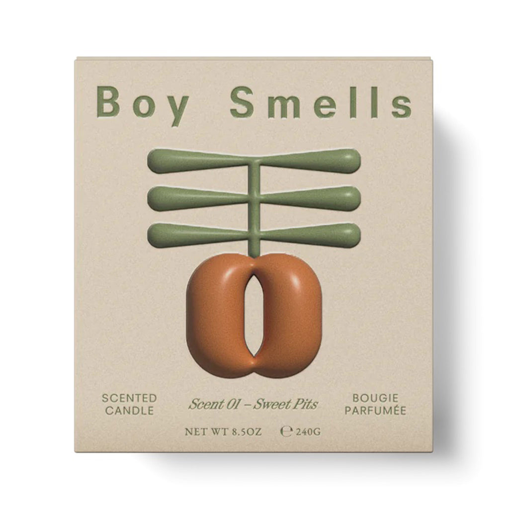 Boy Smells Farm to Candle 2.0 Collection Sweet Pits scented coconut and beeswax blend candle in sage green box packaging with embossed apricot-inspired illustration.