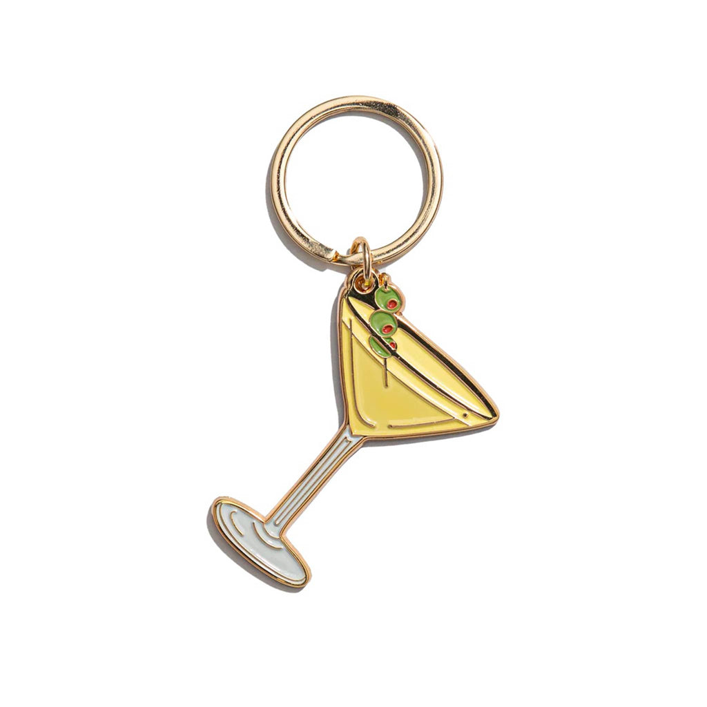 Gold keychain shaped like a martini glass with a olive on a white background.