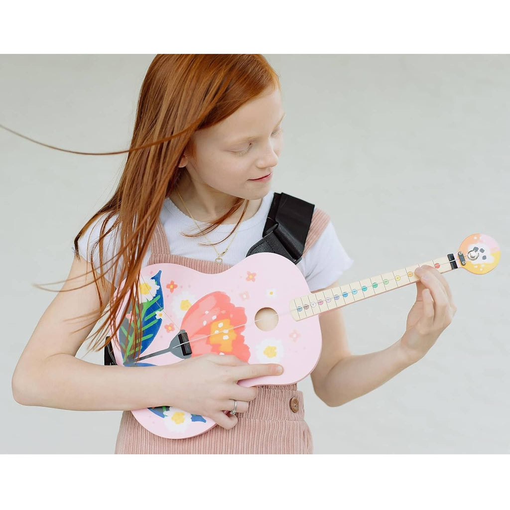 Buffalo Games TinkerTar pink floral one string acoustic guitar for beginners, girl playing guitar.