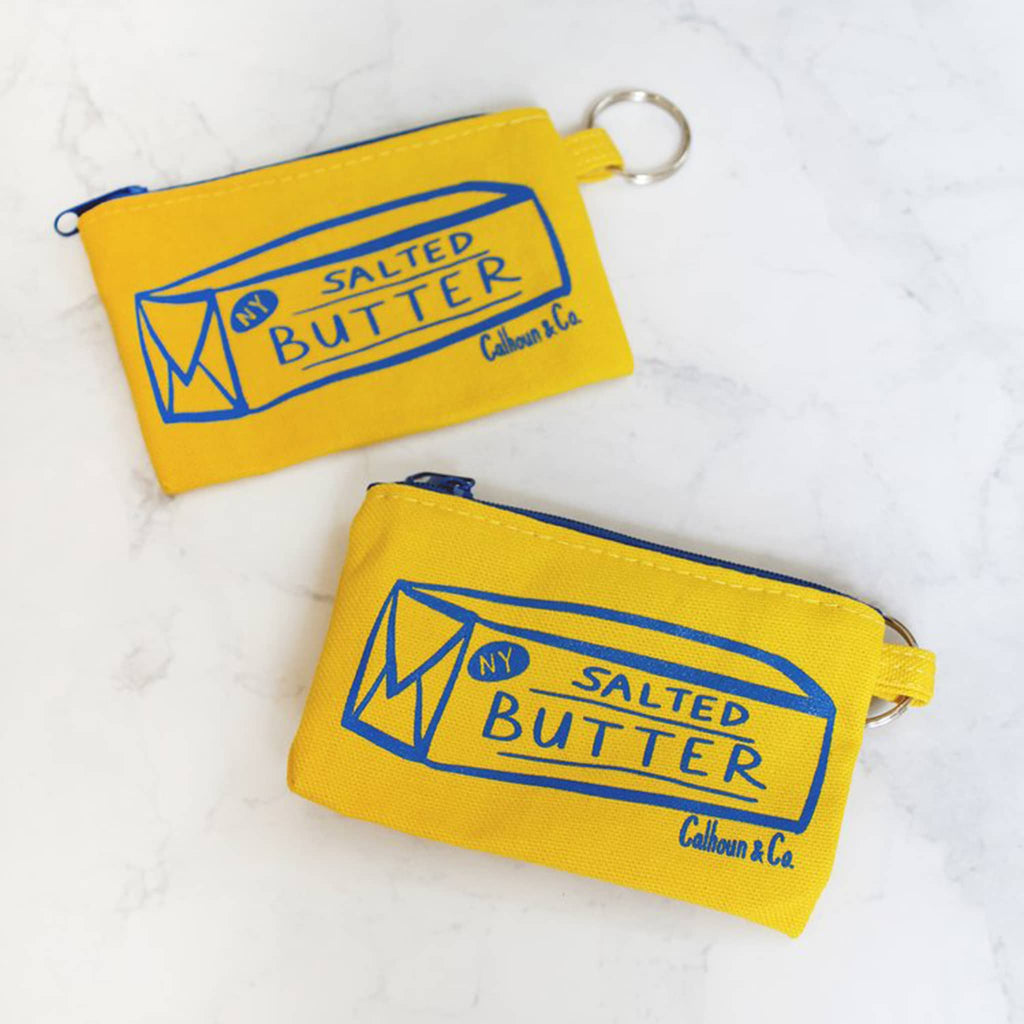 Calhoun and Co NYC Salted Butter yellow zipper card pouches with keyrings, front view.