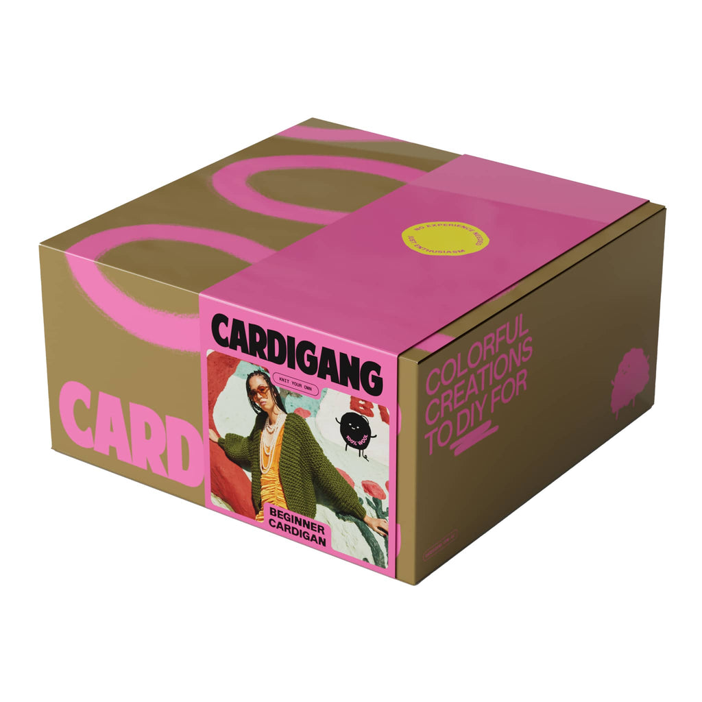 Cardigang Shannon beginner wool cardigan knit kit in olive green, in box packaging, front angle view.