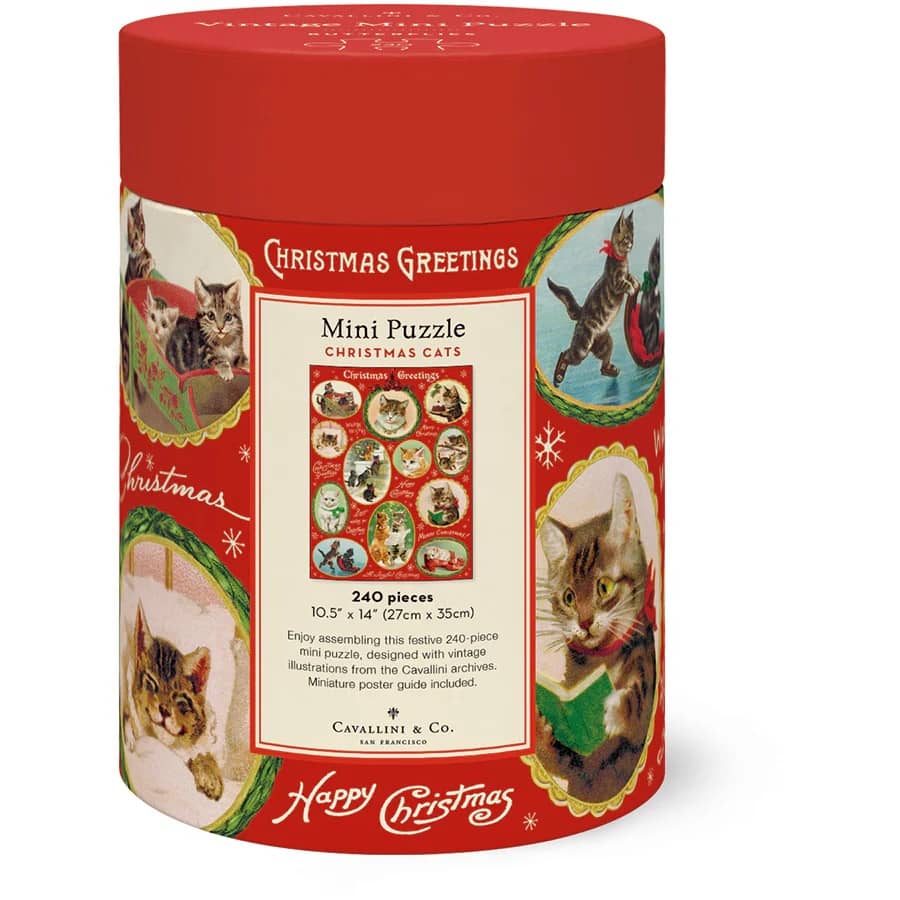 Red cylindrical puzzle box with Christmas-themed cat illustrations and text.