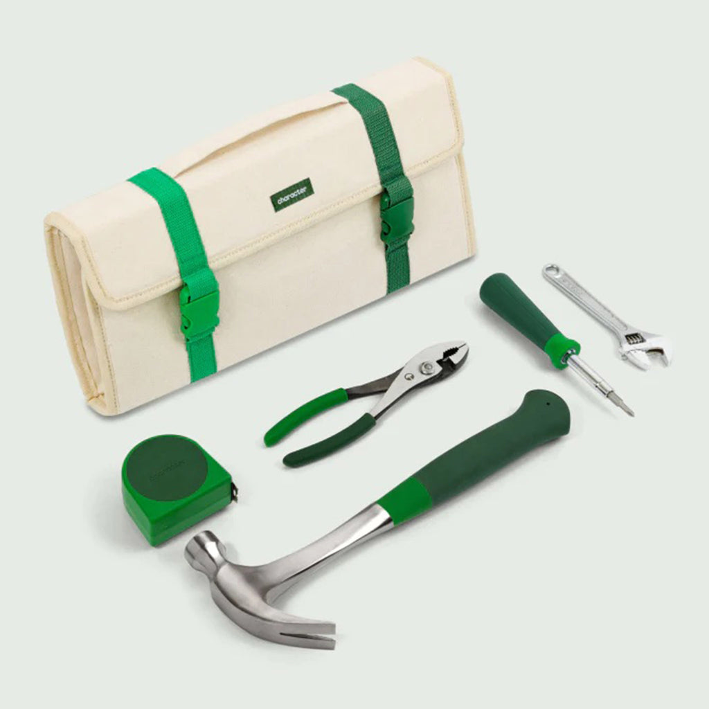 Character "The Go Set" 5 piece tool set with green handles with canvas roll-up tote that has two-tone green buckle closure.