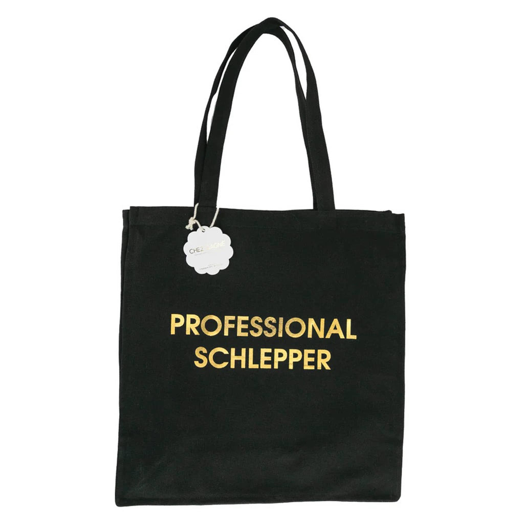 Black tote bag with 'PROFESSIONAL SCHLEPPER' in gold text on a white background.