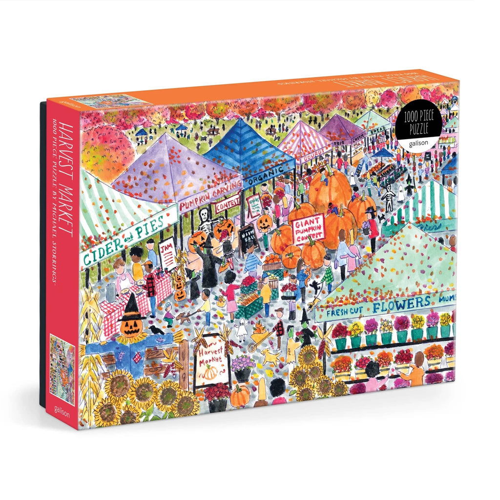 Colorful packaging of a jigsaw puzzle featuring a harvest market scene.