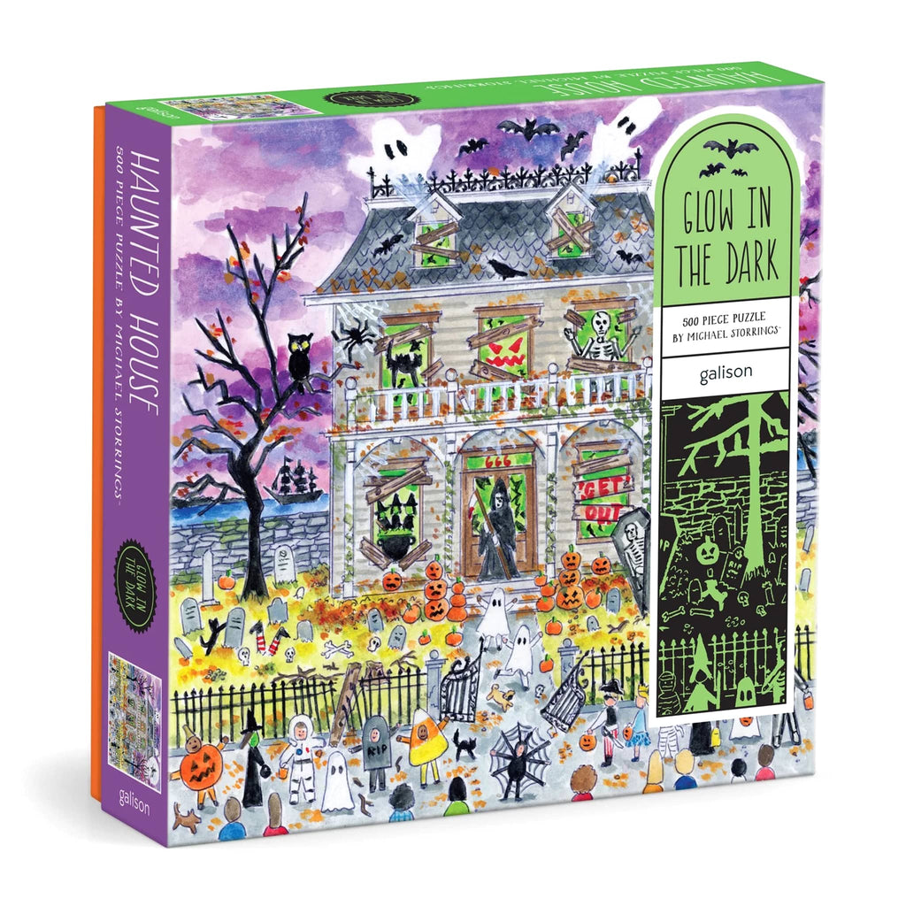 Glow-in-the-dark haunted house puzzle packaging with colorful design.